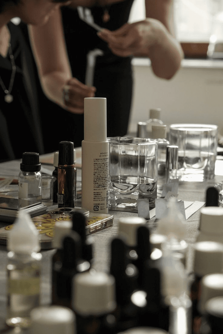 Curated fragrance bottles displayed on a table
